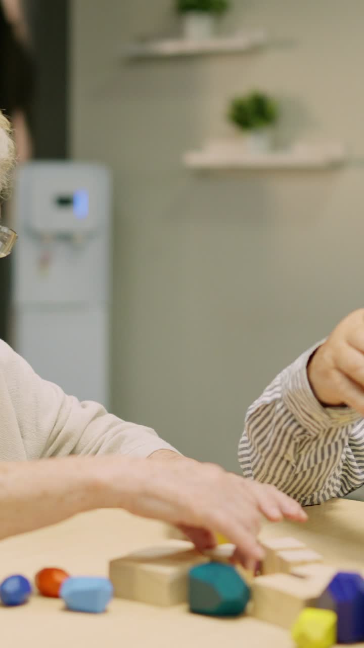 Seniors playing a block game