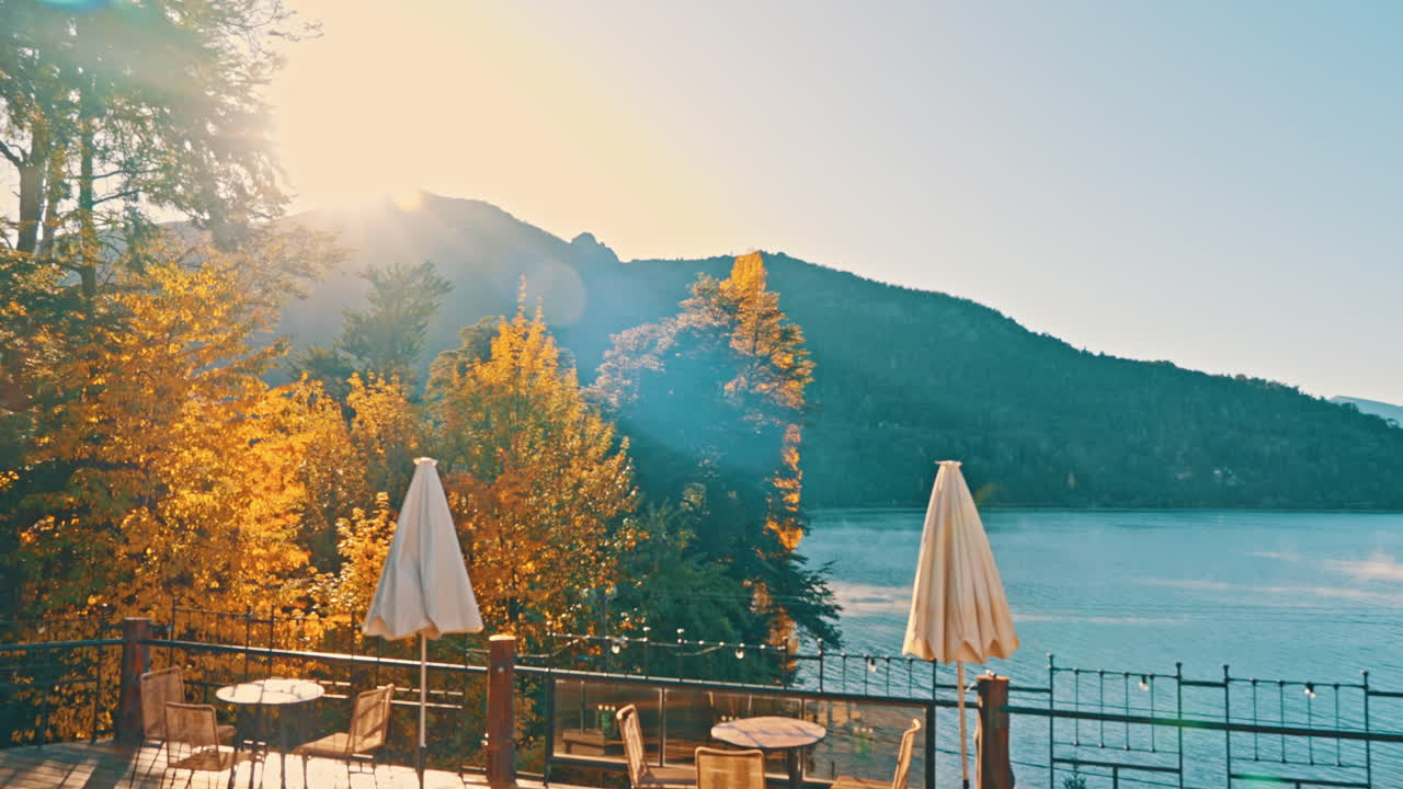 Scenic Autumn View from Lakeside Deck at Golden Hour