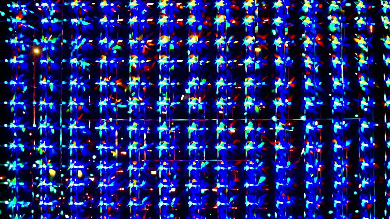 Dynamic sequence of vibrant lights transitioning through colors, showcasing a mesmerizing display of illumination and movement in a captivating visual experience