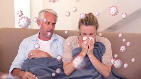 animation of covid 19 cells floating over sick couple