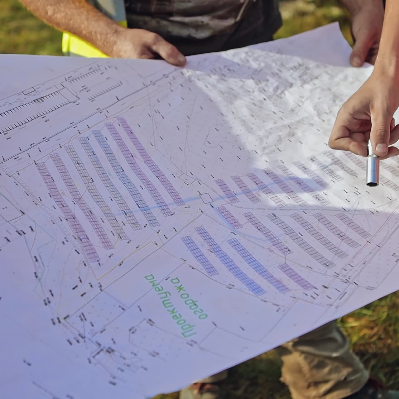 Man showing solar plant project