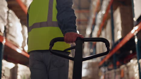 warehouse worker with hand truck