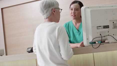 elderly woman talking with specialist doctor or personal doctor, recommended treatment program and procedure receiving treatment or health check. health care, hospital, medical, insurance, retired.