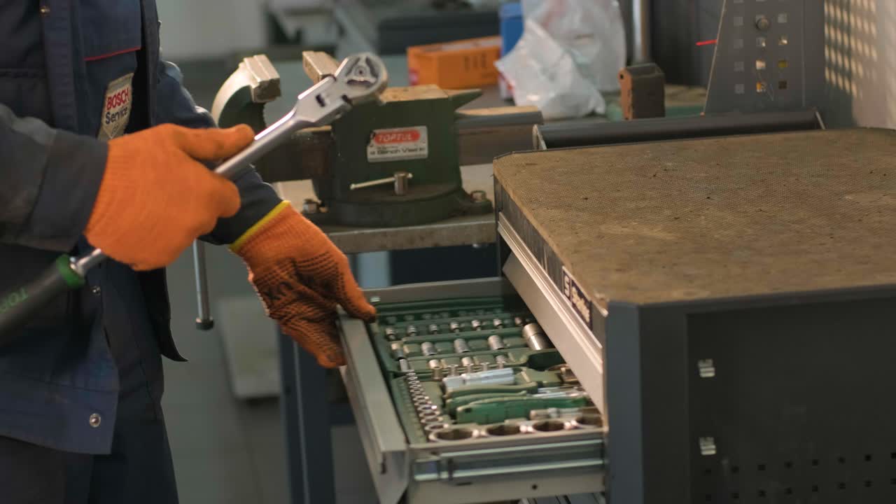 Car Mechanic Looking For Something Inside His Tools Drawer Close Up Video.