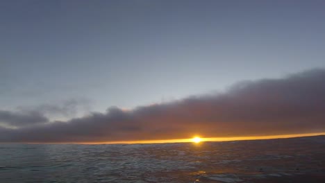 Surfer-showing-an-amazing-sunset-with-go-pro