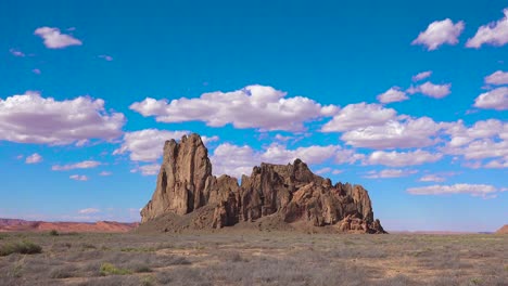 a beautiful time lapse behind a rock formation near monument valley 2