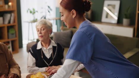 nurse assisting elderly people