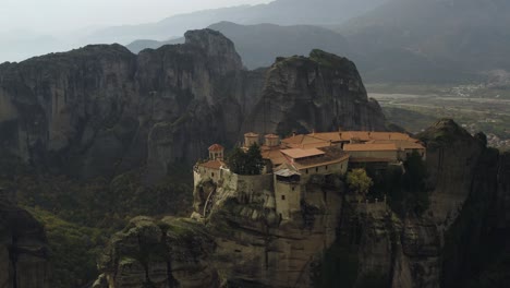 aerial view around the monastery varlaám, in meteora, greece - orbit, drone shot