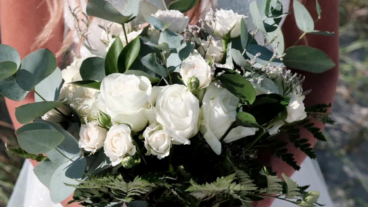 Bouquet of roses and eucalyptus for a wedding