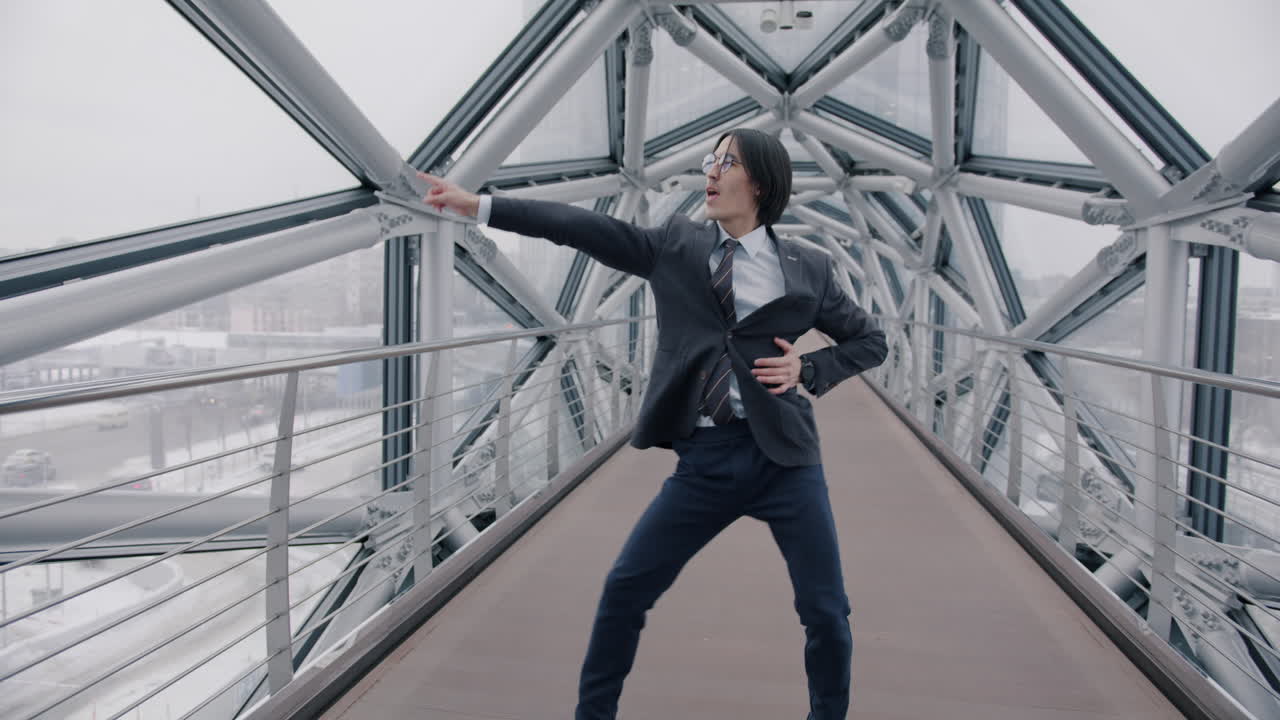 Businessman Dancing on a Modern City Bridge
