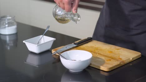 cooking process: pouring oil