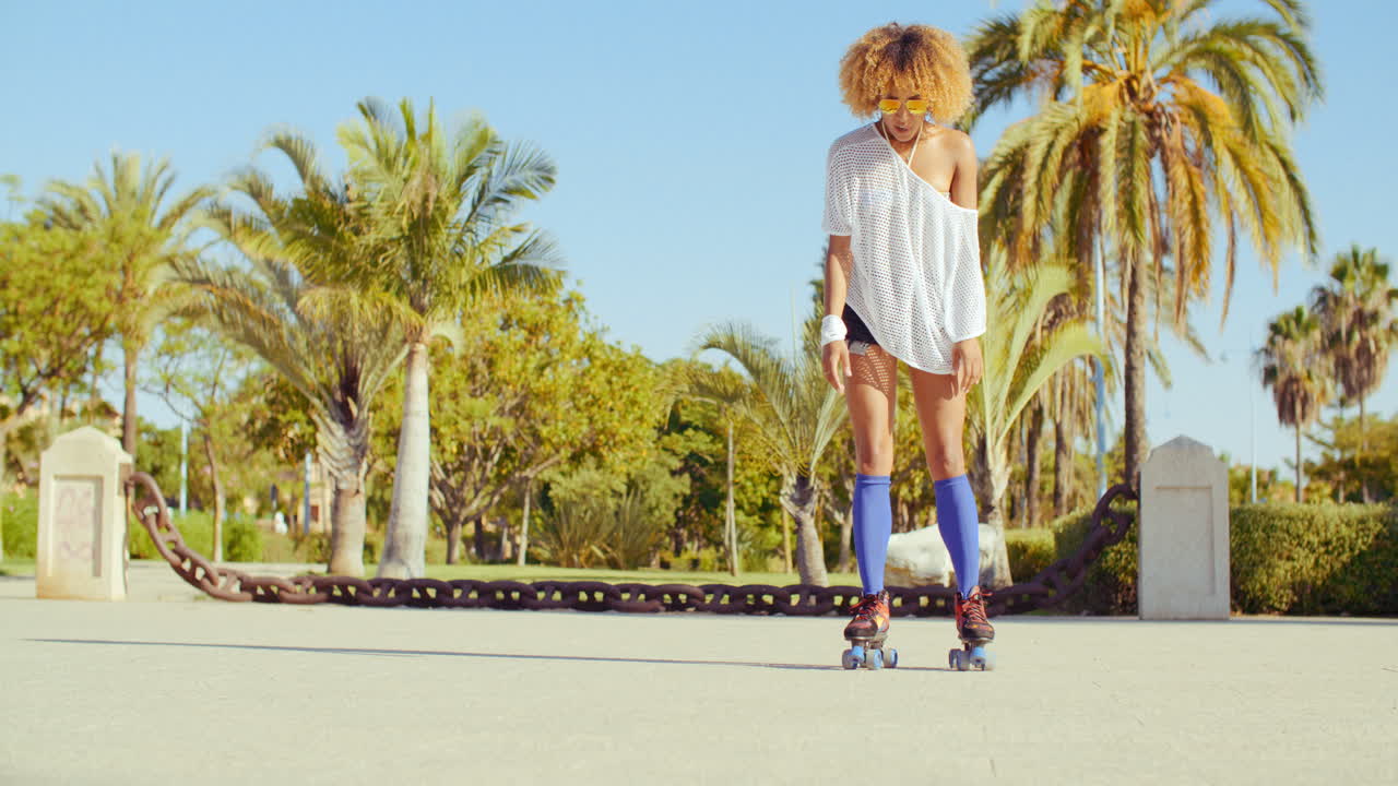 Sexy Flexible Girl Doing Splits on Roller Skates