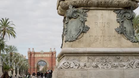 rius taulet monument and arc de triomf in distance in barcelona city