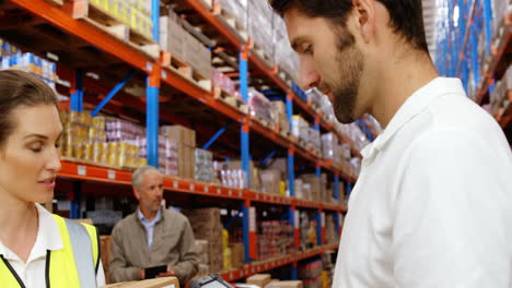 warehouse workers working together