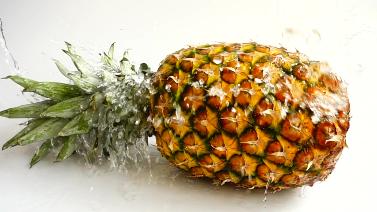 Fresh ripe pineapple. Slow motion.