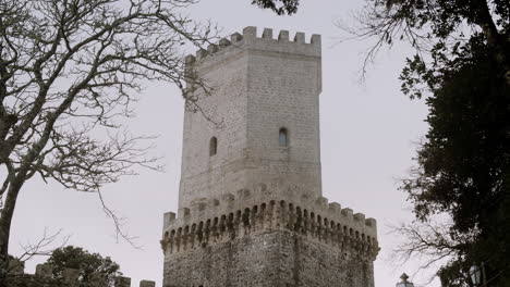ancient stone tower in a park