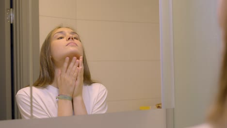 depressed frustrated young woman suffering from headache, touching face