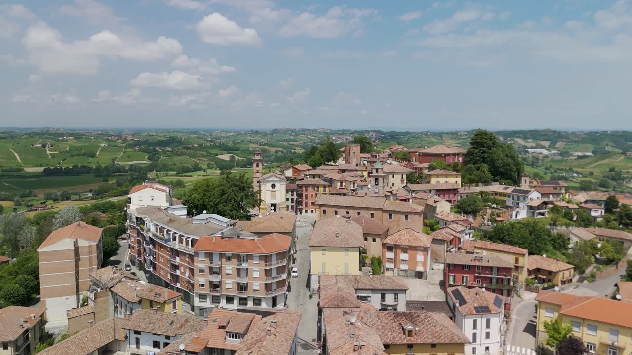 Agliano Terme, Asti, Piedmont, Italy. 4k aerial view of the town. Langhe-Roero and Monferrato. Flying forward above the town.