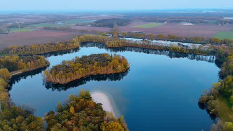 netherlands aerial landscape view. breathtaking aerial view of a winding waterway framed by lush trees and vibrant autumn colors in the netherlands