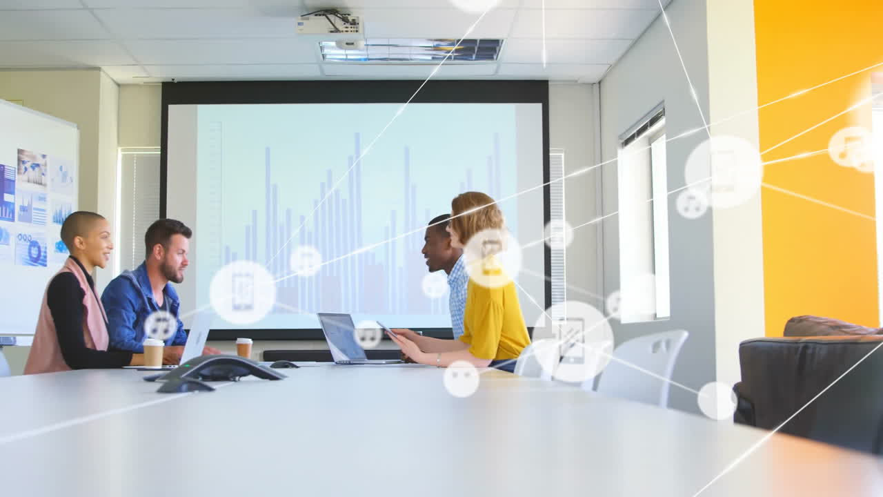 Animation of network of connections with icons over diverse business people in office