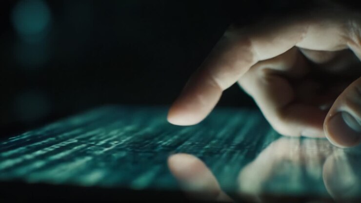 A Close-Up of a Human Finger Interacting with a Futuristic Touchscreen Display, Highlighting the Interaction Between Technology and Human Touch