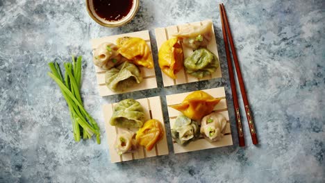 delicious mixed kinds of chinese dumplings served on wooden stands