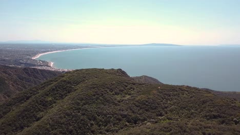 4k aerial drone footage of santa monica mountains and skyline of los angeles california ocean coastline during summer