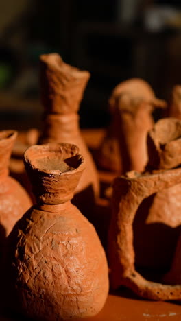 close-up of unfired clay art pieces