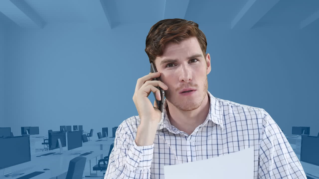 Animation of businessman speaking on smartphone over empty office