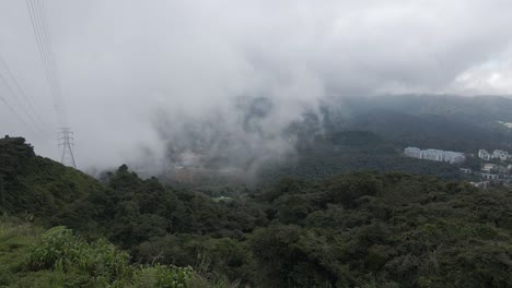 cloud rolls into tanah rata valley in malaysia mountain time-lapse