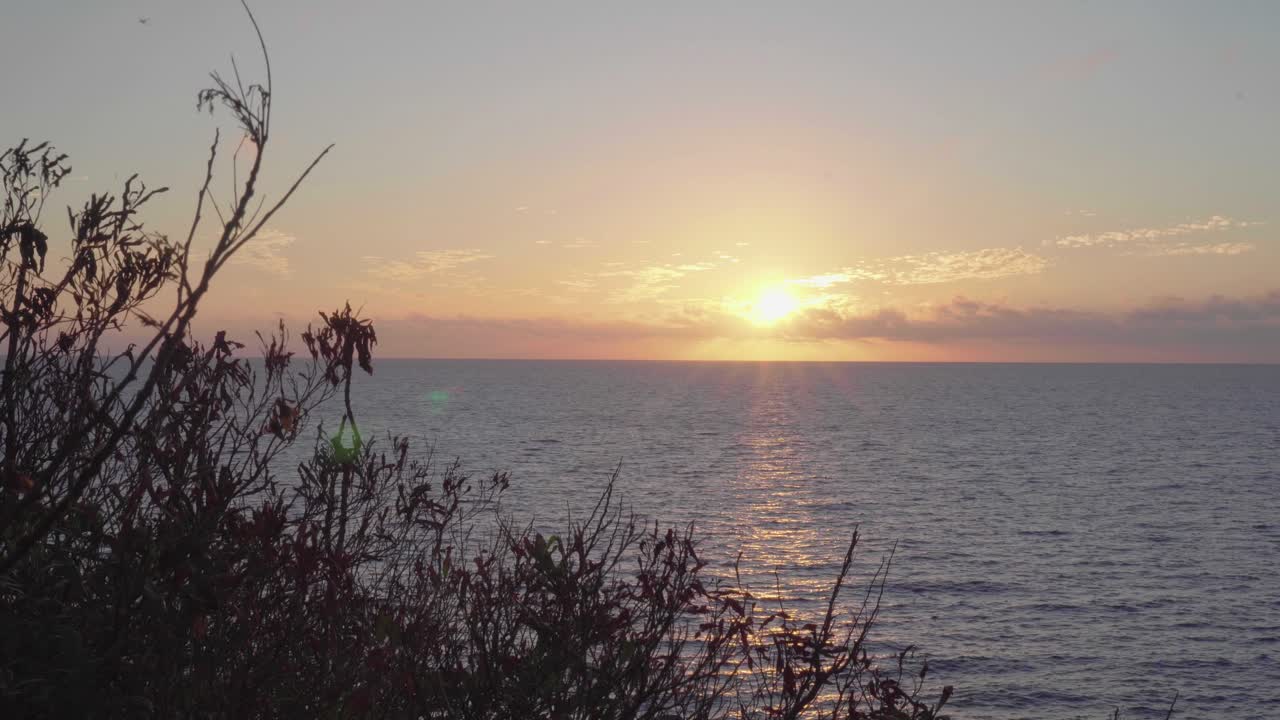 The beautiful romantic colors of sunset view from the islands of Fiji - wide shot