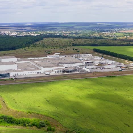 aerial view of industrial poultry house in the country. modern factory exterior