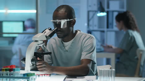 african american scientist conducting lab research