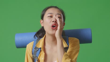woman with backpack in different expressions