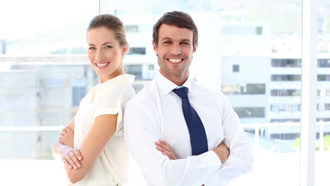 happy business team looking at camera