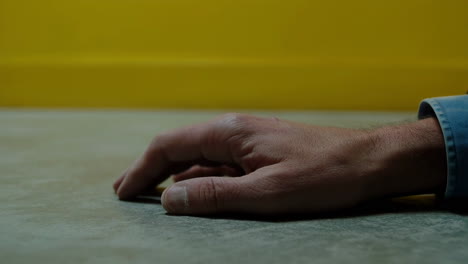 a hand on a surface