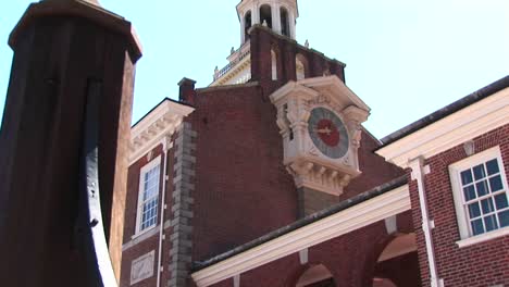 The-Camera-Pans-Up-From-Streetlevel-To-A-Clockface-On-The-Side-Of-Independence-Hall-Philadelphia