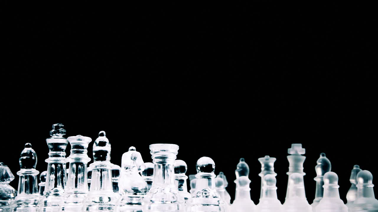 A fantastic chessboard with two different full sets of chess pieces made of glass, rotating into a starting position for one player, with the inspiring text: Play