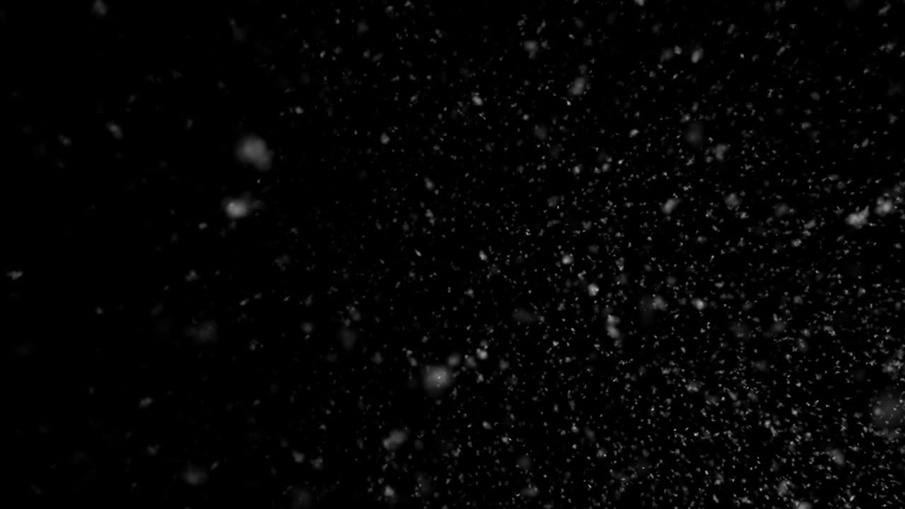 겨울, 검은 바탕에 고립 된 눈이 떨어집니다.