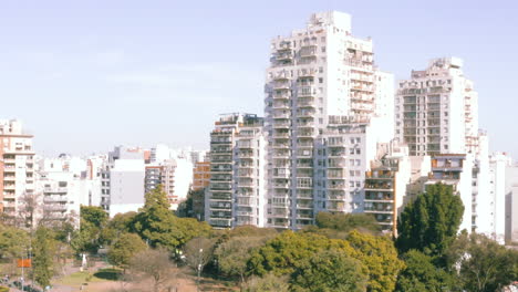 aerial - apartment buildings and skyline of buenos aires, argentina, rising shot