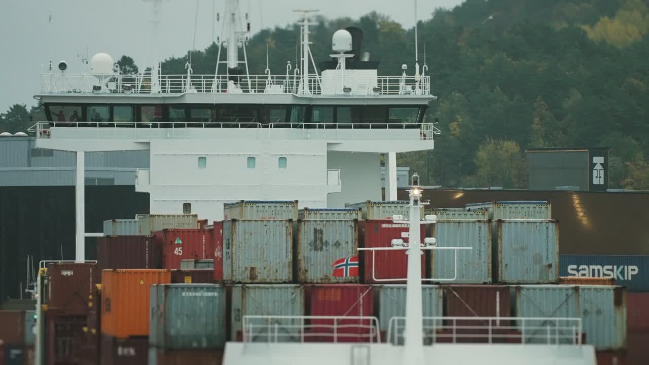 A cargo ship in the Kristiansand port in the early morning. Slow-motion.