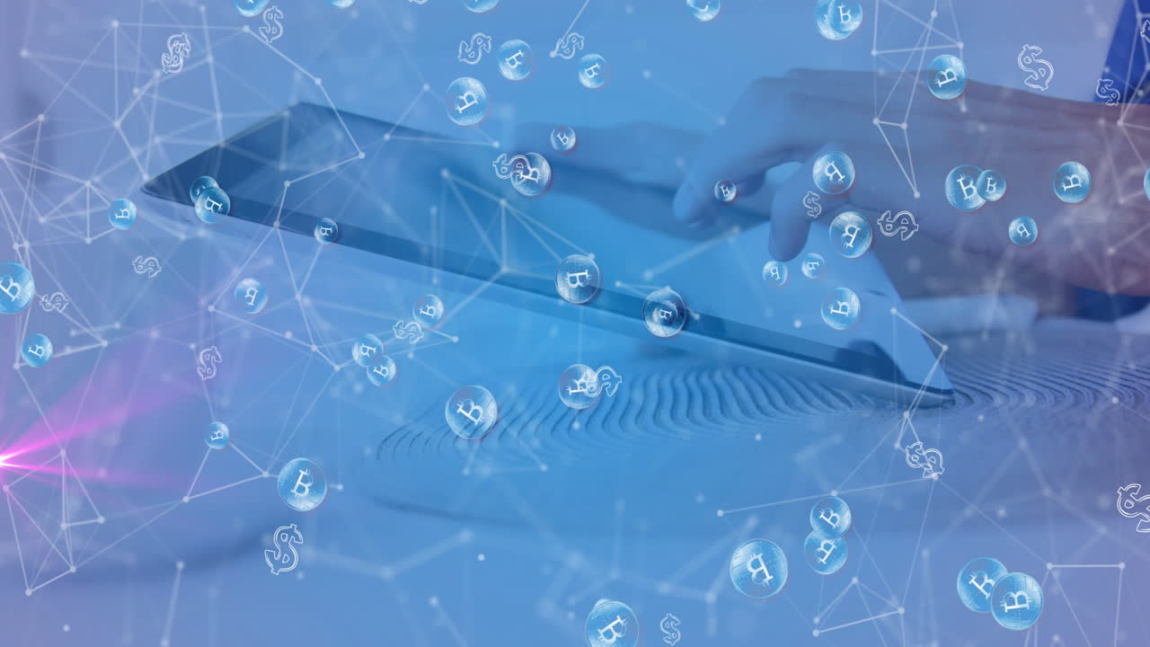 Using tablet, hands interacting with cryptocurrency symbols and animation overlay
