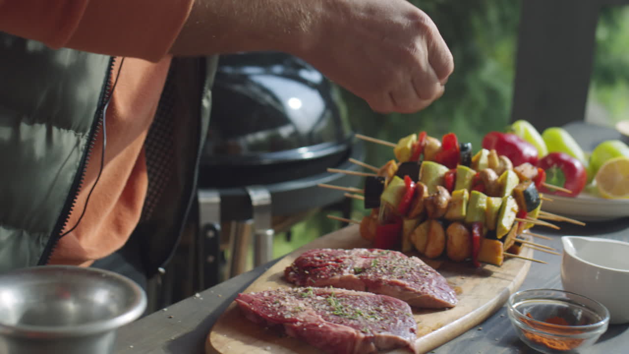 Adding Herbs to Meat Steaks before Cooking