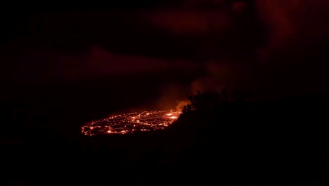 fresh red lava volcanic eruption in the dark in kilauea, big island hawaii usa