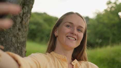 woman, mobile phone, video call, smiling