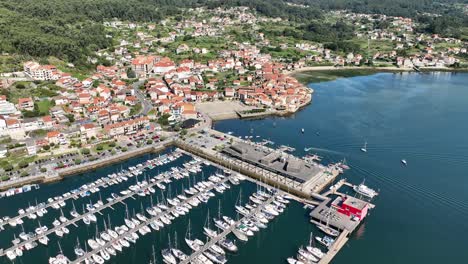 Elevated-Drone-View-of-Combarro-Harbor-and-Docked-Boats