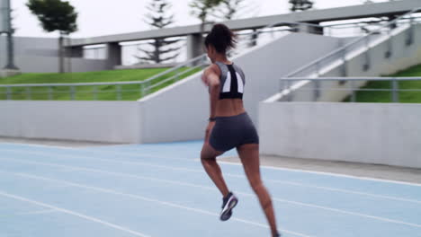 woman running on a track