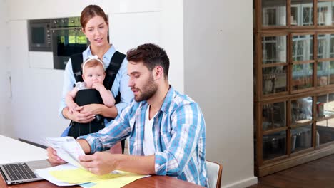 Worried-man-looking-at-bills