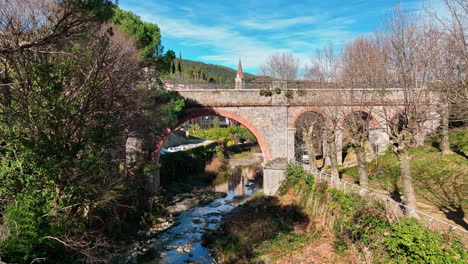 The-Mondony-river-and-the-parish-church-of-Our-Lady-of-Life,-in-Amélie-les-Bains