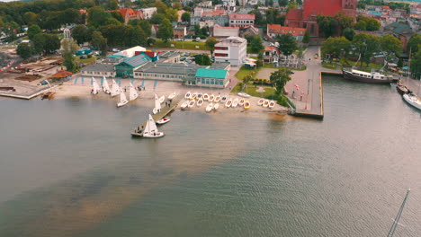 drone flying above puck's bay towards the city of puck